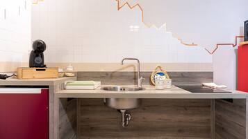 Fridge, microwave, stovetop, coffee/tea maker