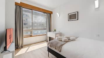 1 slaapkamer, een strijkplank/strijkijzer, internet, beddengoed