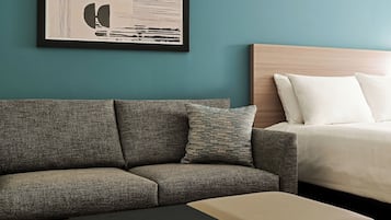 Suite (2 kingbed w Sofabed) | In-room safe, desk, laptop workspace, blackout drapes