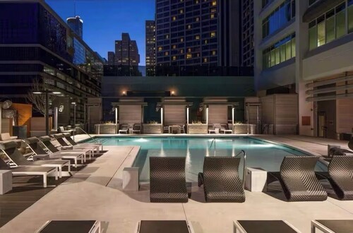 Toast to the City/ ATL High-Rise with Bar & Views