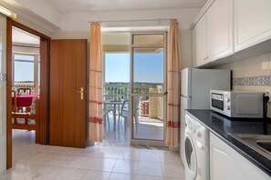 Fridge, stovetop, toaster, cookware/dishes/utensils