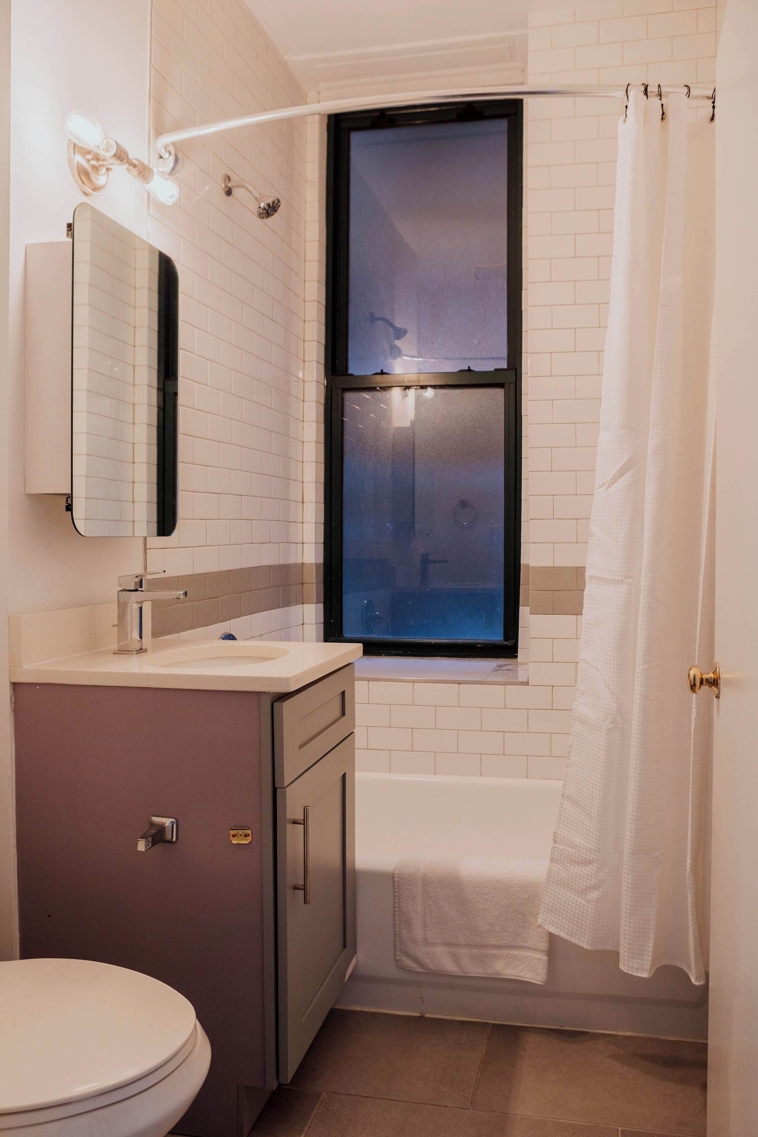 Shower, hair dryer, towels, shampoo