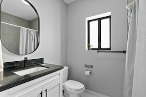 Shower, hair dryer, towels