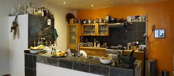 Spacious bedroom in characterful period flat.