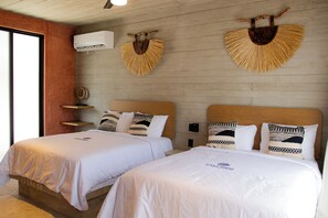 Family Suite, 2 Queen Beds | In-room safe, blackout drapes, free WiFi, bed sheets