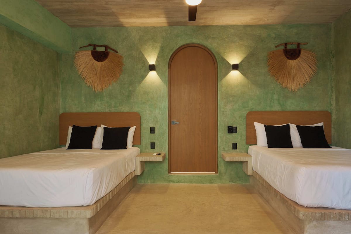 Family Suite, 2 Queen Beds | In-room safe, blackout drapes, WiFi (free), bed sheets