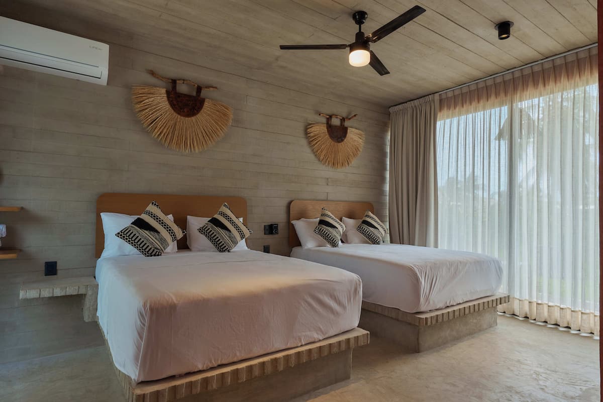 Family Apartment, 2 Queen Beds | In-room safe, blackout drapes, WiFi (free), bed sheets
