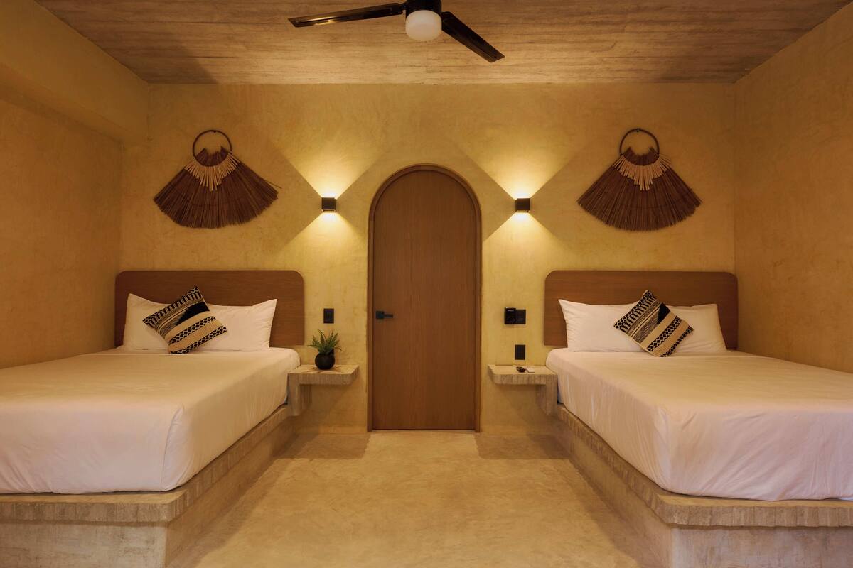 Family Suite, 2 Double Beds | In-room safe, blackout drapes, WiFi (free), bed sheets