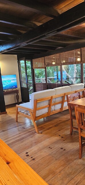 Cabin, 3 Bedrooms, Patio, Garden View | Living area | 43-inch Smart TV with satellite channels, Netflix, books