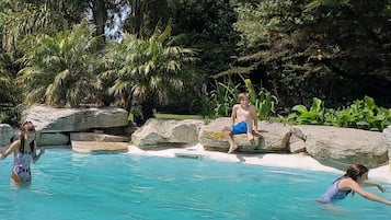 Outdoor pool, pool umbrellas, sun loungers