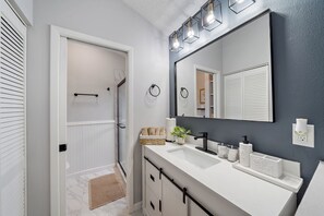 Hair dryer, towels, soap, shampoo