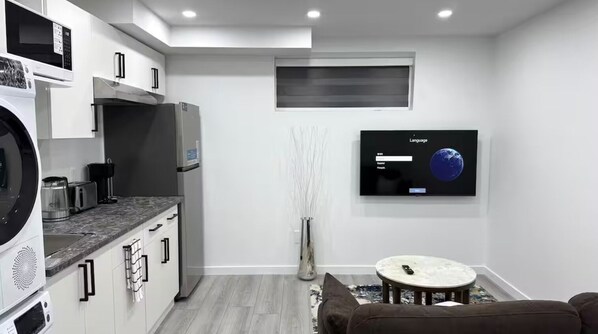 Fridge, microwave, coffee/tea maker, electric kettle