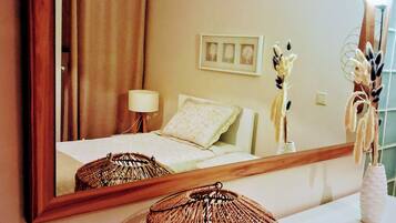 2 dormitorios, tabla de planchar con plancha, wifi gratis y ropa de cama