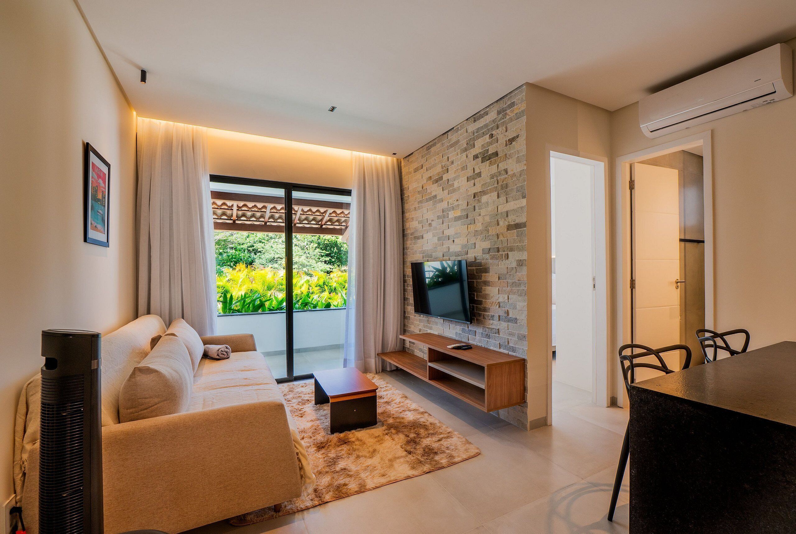 Departamento Confort | Área de sala de estar | Smart TV 