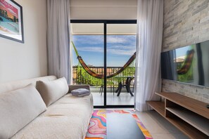 Basic Apartment | Living area | Smart TV - Miami House Cumbuco by Carpediem (Caucaia)