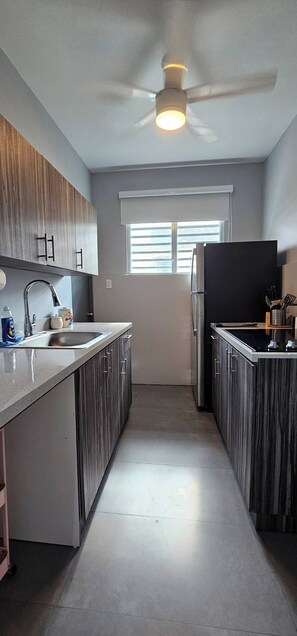 Fridge, microwave, coffee/tea maker, toaster