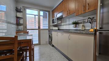 Fridge, microwave, dishwasher, coffee/tea maker