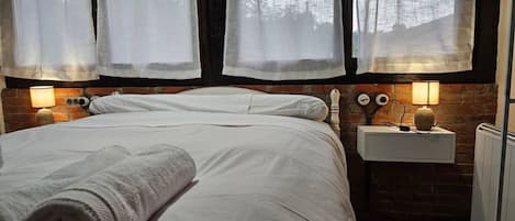 1 chambre, fer et planche à repasser, Wi-Fi gratuit, draps fournis