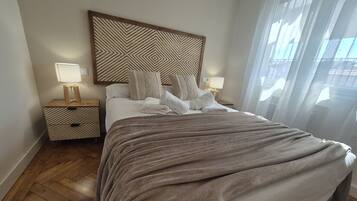 4 dormitorios, tabla de planchar con plancha, wifi gratis y ropa de cama