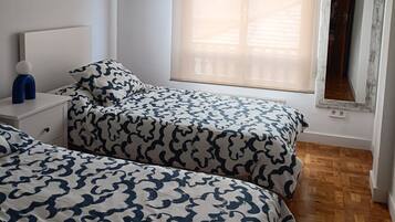 3 dormitorios, tabla de planchar con plancha, wifi gratis y ropa de cama