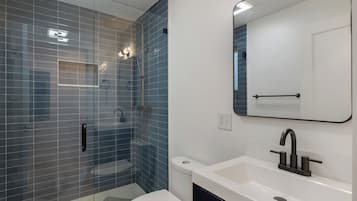 Shower, towels, soap, toilet paper
