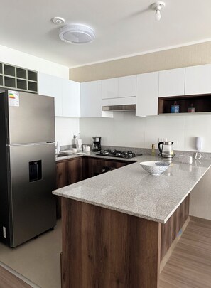 Fridge, microwave, oven, coffee/tea maker