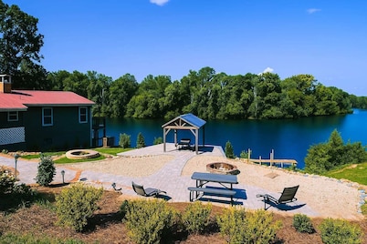 Escape to Tranquil Waters, where comfort meets calm. Enjoy serene river views and waterfront access, inviting spaces, and the perfect backdrop for rest, romance, or family fun. Boat Rental and Fishing Charters available anytime of the year.