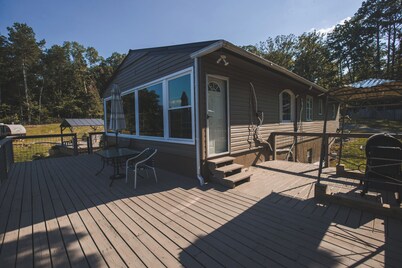 Escape to Tranquil Waters, where comfort meets calm. Enjoy serene river views and waterfront access, inviting spaces, and the perfect backdrop for rest, romance, or family fun. Boat Rental and Fishing Charters available anytime of the year.