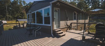Escape to Tranquil Waters, where comfort meets calm. Enjoy serene river views and waterfront access, inviting spaces, and the perfect backdrop for rest, romance, or family fun. Boat Rental and Fishing Charters available anytime of the year.
