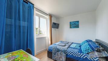 2 chambres, fer et planche à repasser, Wi-Fi, draps fournis