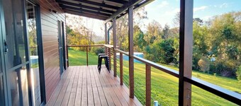 Girayir Cottage. Nestled amongst native gardens in the Byron hinterland.