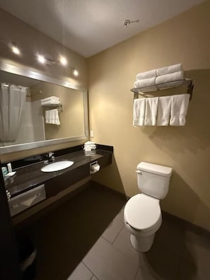 Combined shower/tub, hair dryer, towels, soap