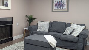 Living area - Spacious 2-bedroom suite minutes from Montreal attractions (Brossard)