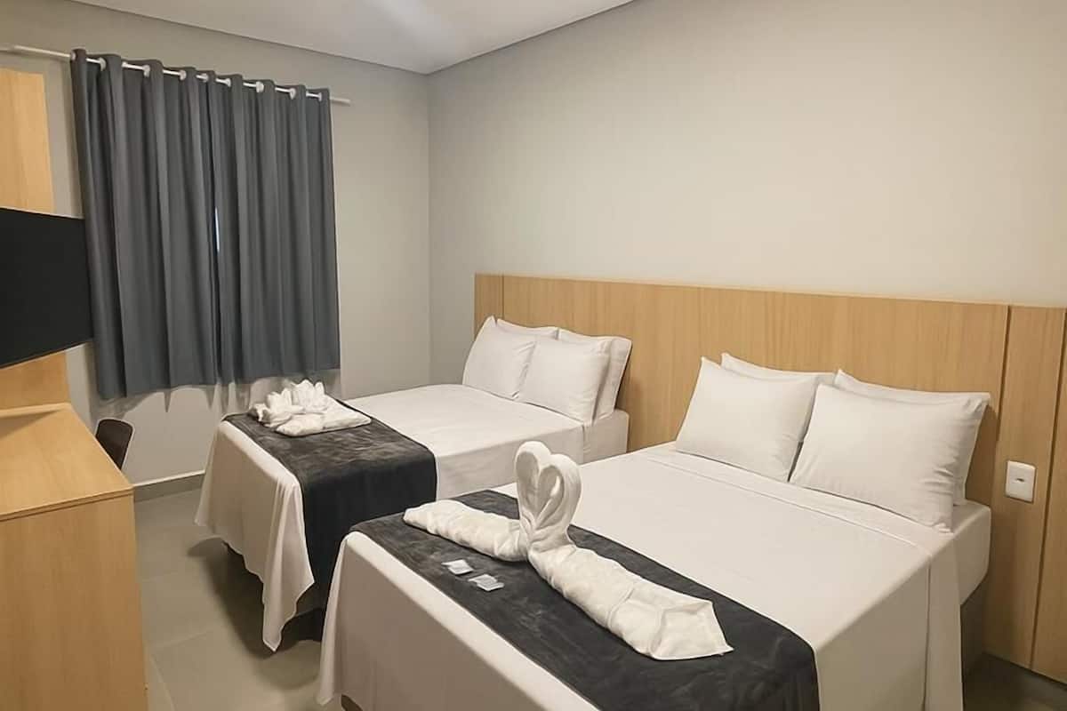 Triple Room | Minibar, desk, laptop workspace, free WiFi