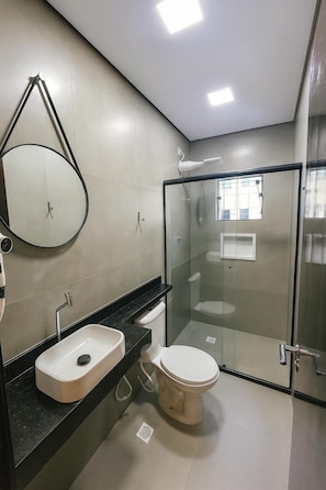 Quadruple Room | Bathroom | Shower, hair dryer, towels, soap