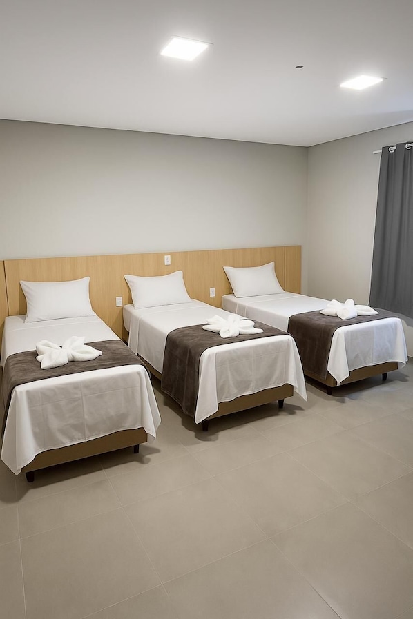 Triple Room | Minibar, desk, laptop workspace, free WiFi