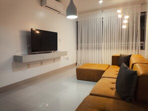 Apartamento família | Área de estar