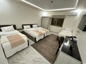 Chambre Triple Confort | Coffres-forts dans les chambres, bureau, Wi-Fi gratuit