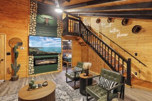 Smart TV, fireplace, DVD player, books