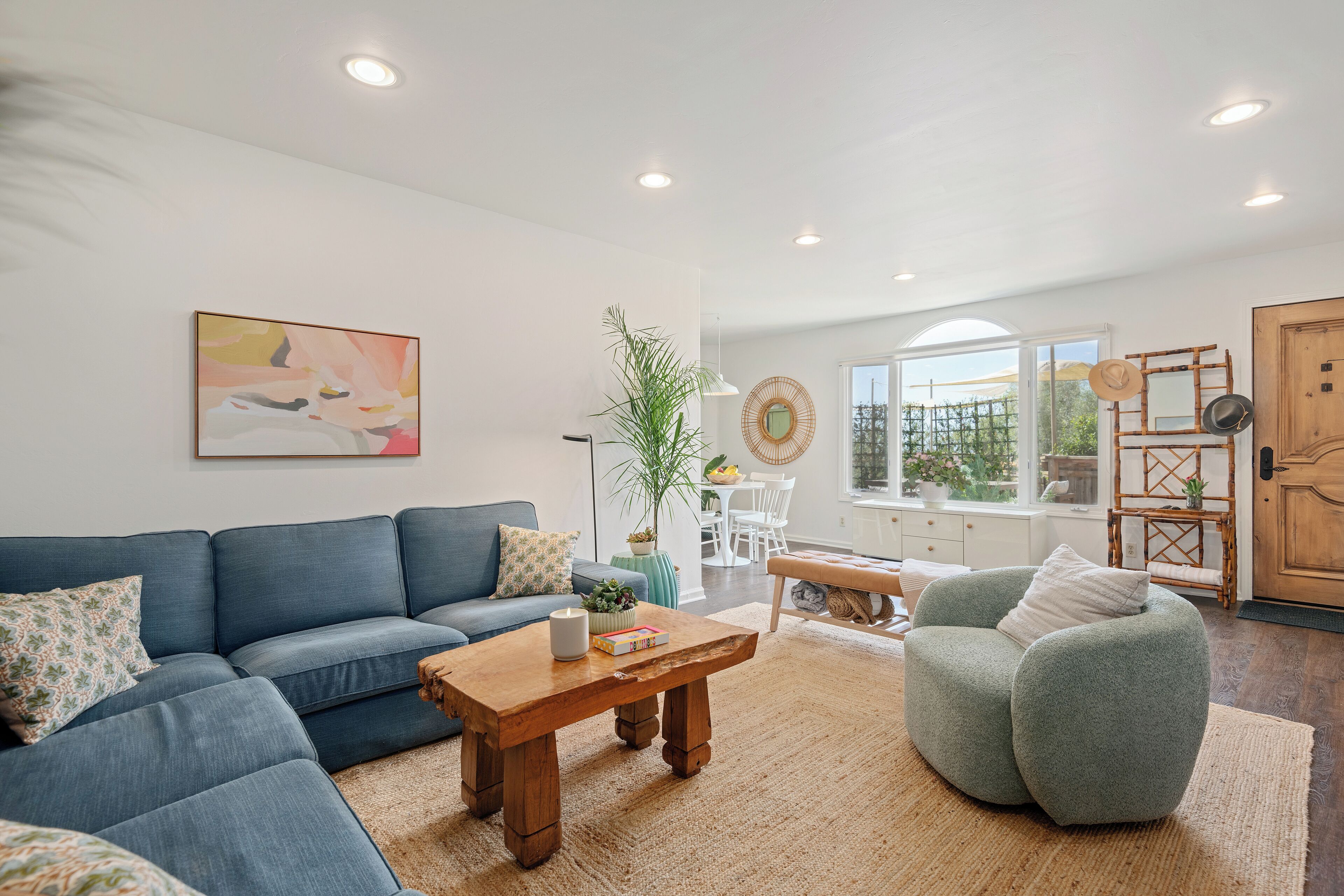 Living room with a large window and ample natural light.
