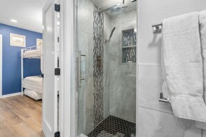 Shower, hair dryer, towels
