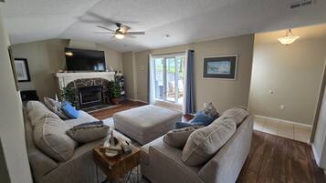 Smart TV, fireplace, books