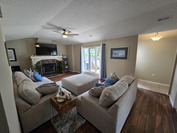 Smart TV, fireplace, books