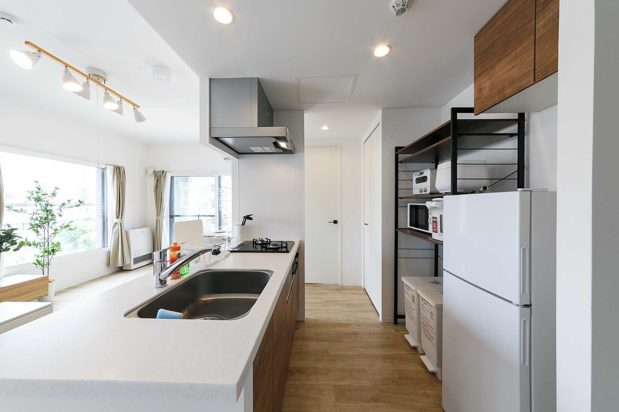 ห้องสวีท, ปลอดบุหรี่ (201) | ครัวส่วนตัว | ตู้เย็น, ไมโครเวฟ, เตาประกอบอาหาร, กาต้มน้ำไฟฟ้า