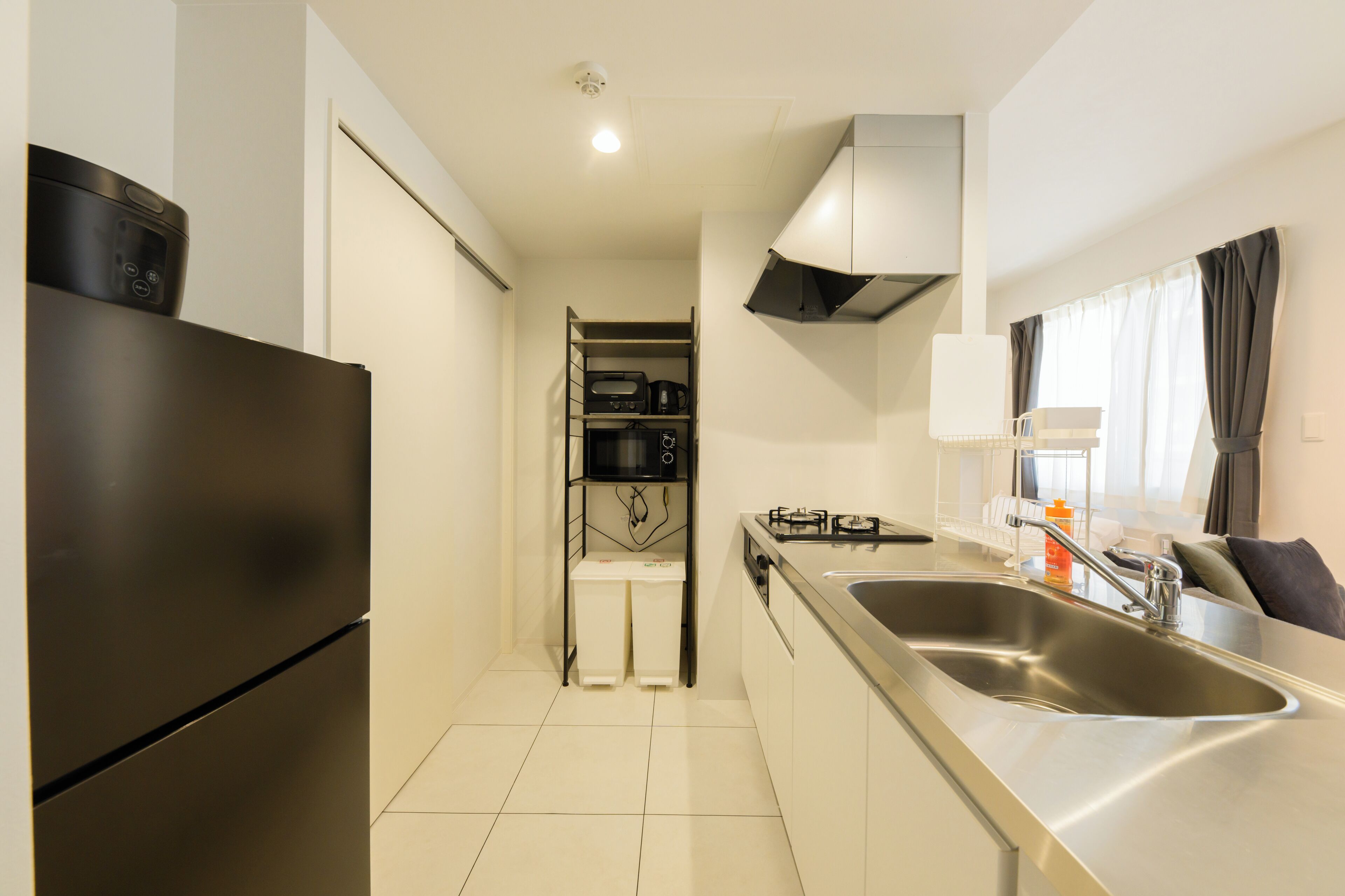 Escrivaninha, cortinas blackout, Wi-Fi de cortesia, roupa de cama