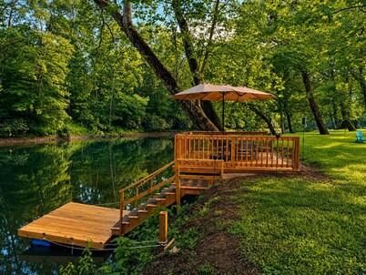 Charming 2 BR, nestled on Buckhannon River, with deck, dock, fire-pit, & kayaks