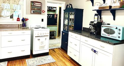 Charming 2 BR, nestled on Buckhannon River, with deck, dock, fire-pit, & kayaks
