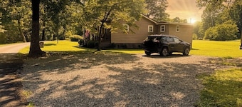 Charming 2 BR, nestled on Buckhannon River, with deck, dock, fire-pit, & kayaks