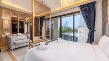 Design Suite, Balcony, Lagoon View | Memory foam beds, in-room safe, iron/ironing board, cribs/infant beds