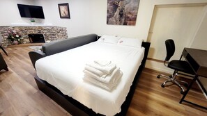 1 غرفة نوم ومكواة/لوح كي وواي فاي وملاءات أسرّة